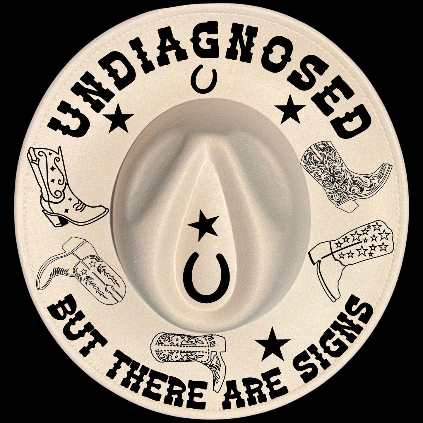 Undiagnosed Cowgirl Boots But There Are Signs burned hat burning design on a wide brim hat.