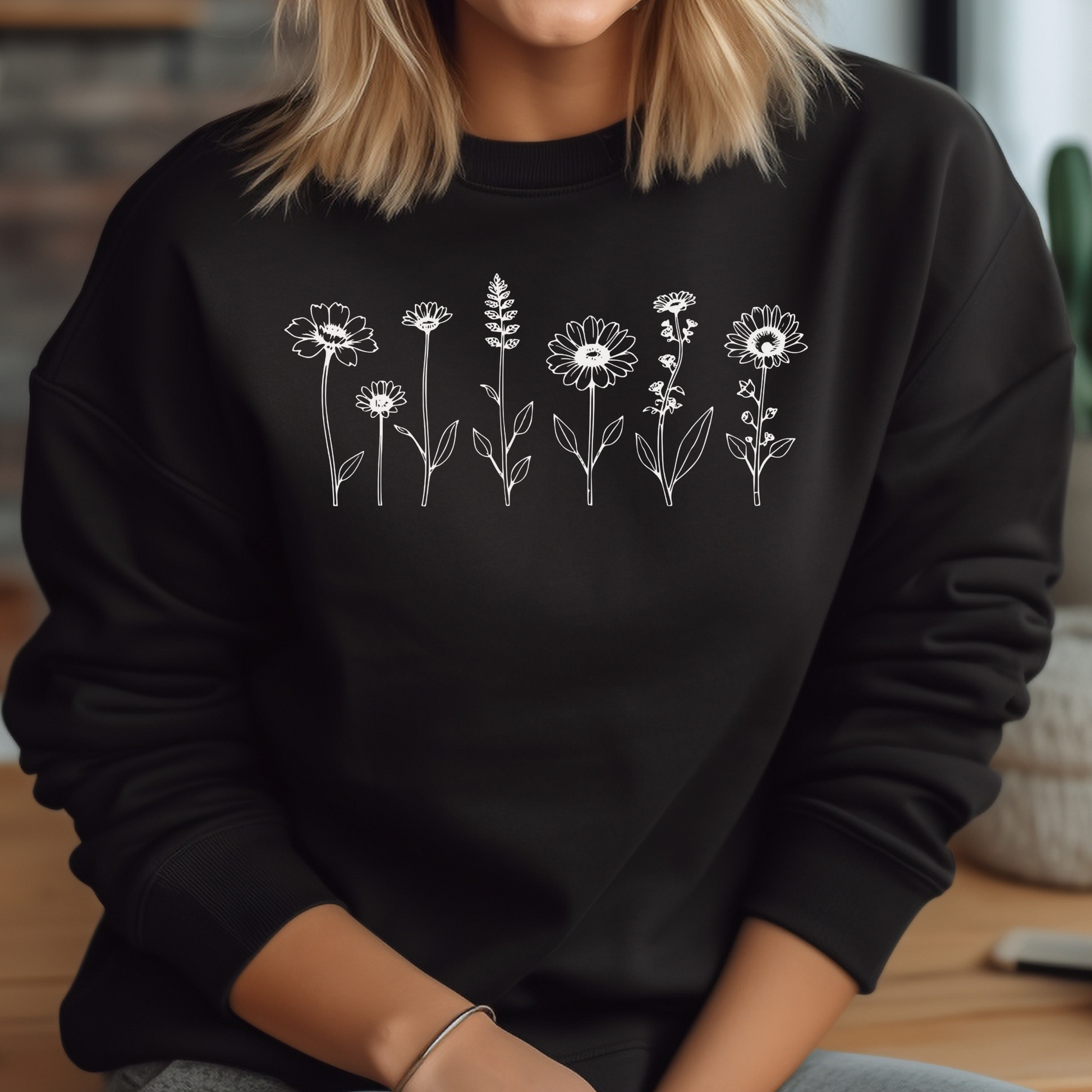 Wildflowers Floral digital download on a woman’s black sweatshirt