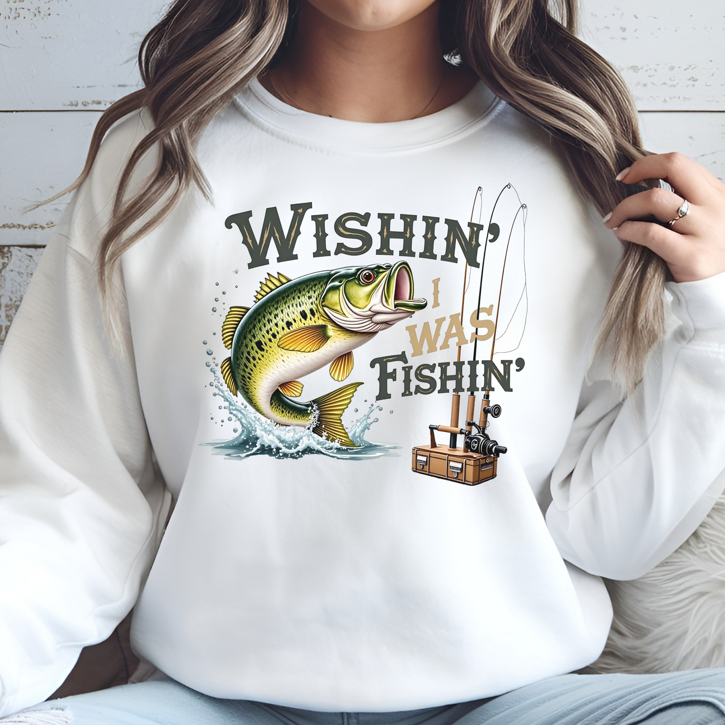 Wishin' I Was Fishin' digital design on a woman's white sweatshirt
