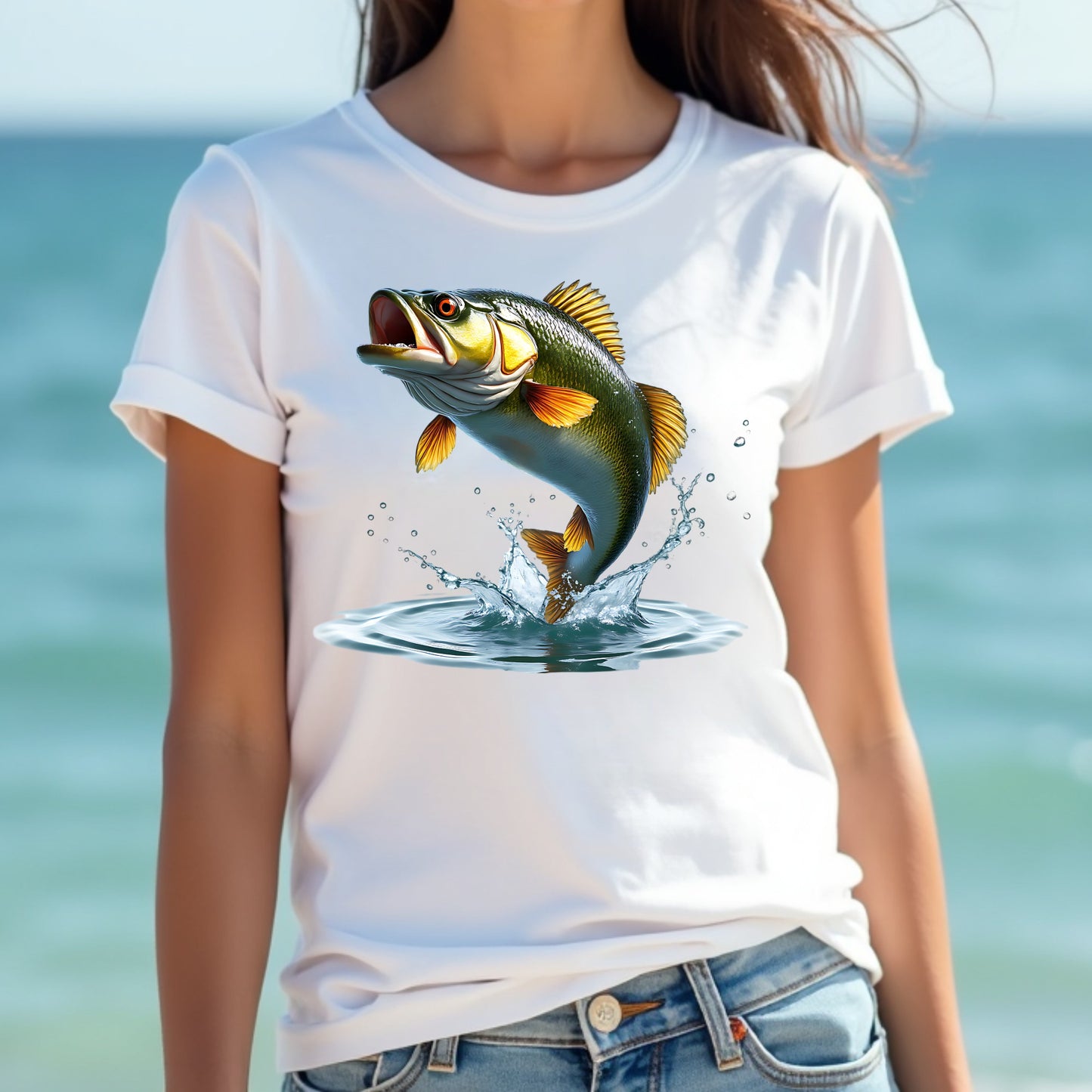 Woman wearing a white t-shirt with a bass fish graphic against a blurred beach background