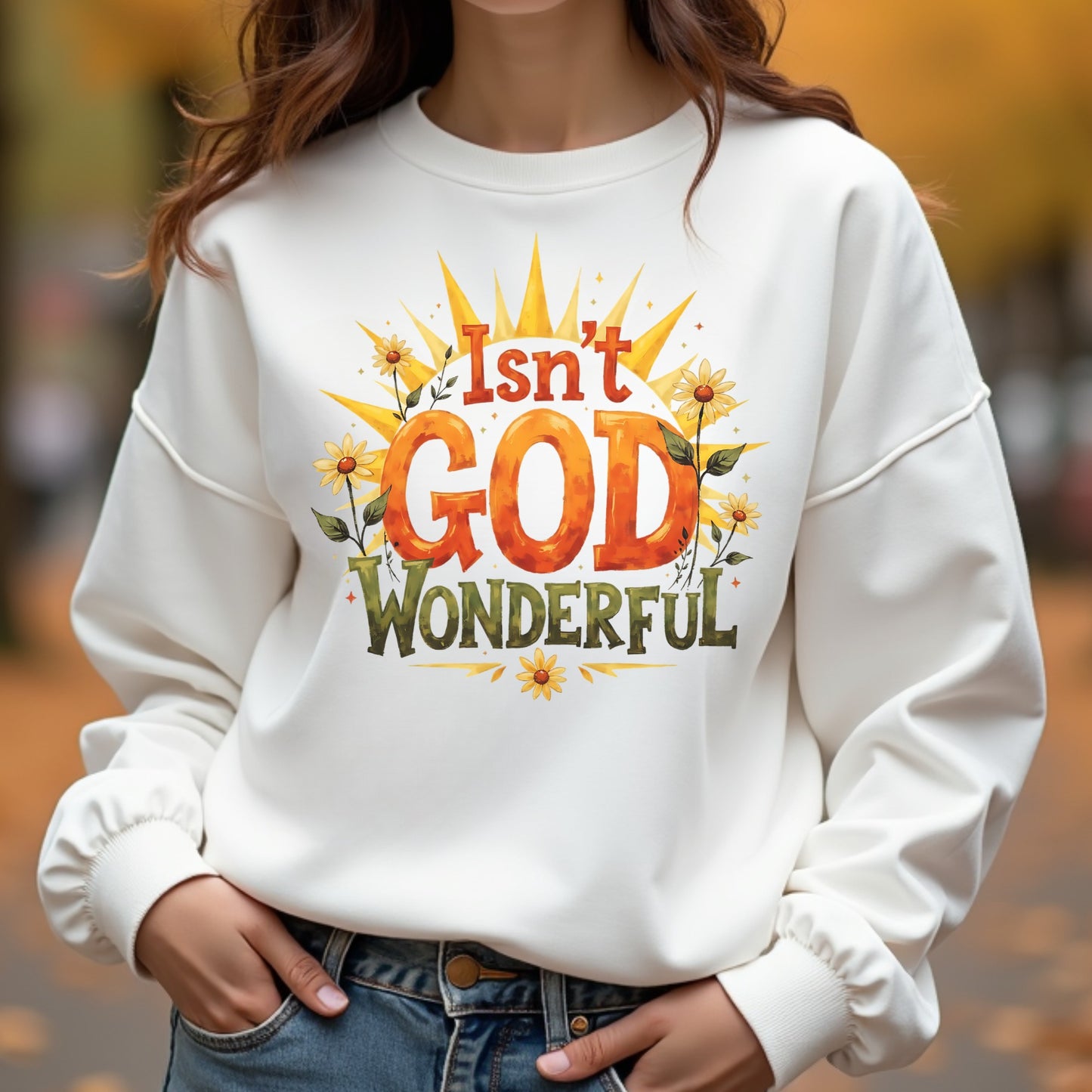 Woman wearing a white sweatshirt with 'Isn't God Wonderful' text and sunflower design.