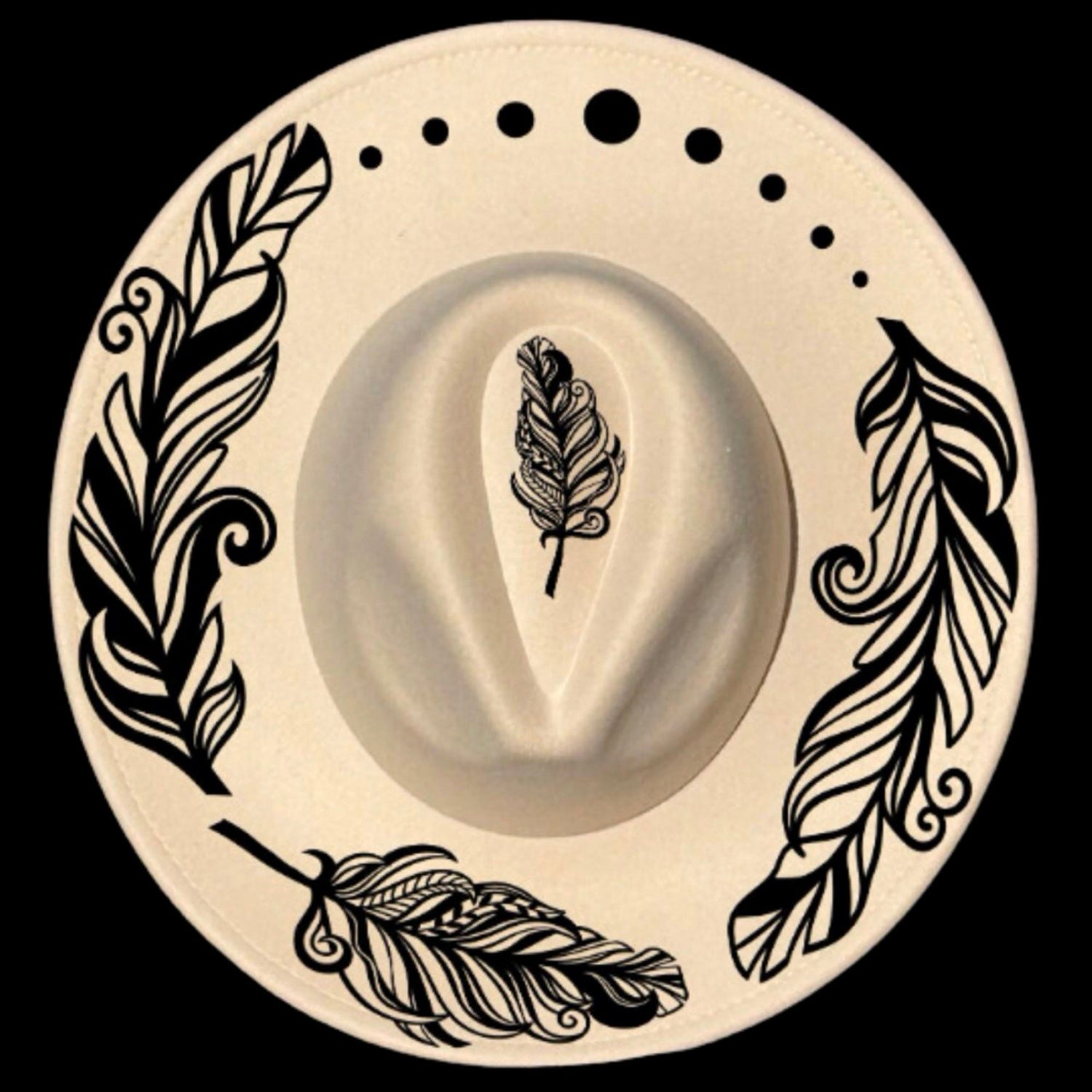 Feather design on a wide brim hat