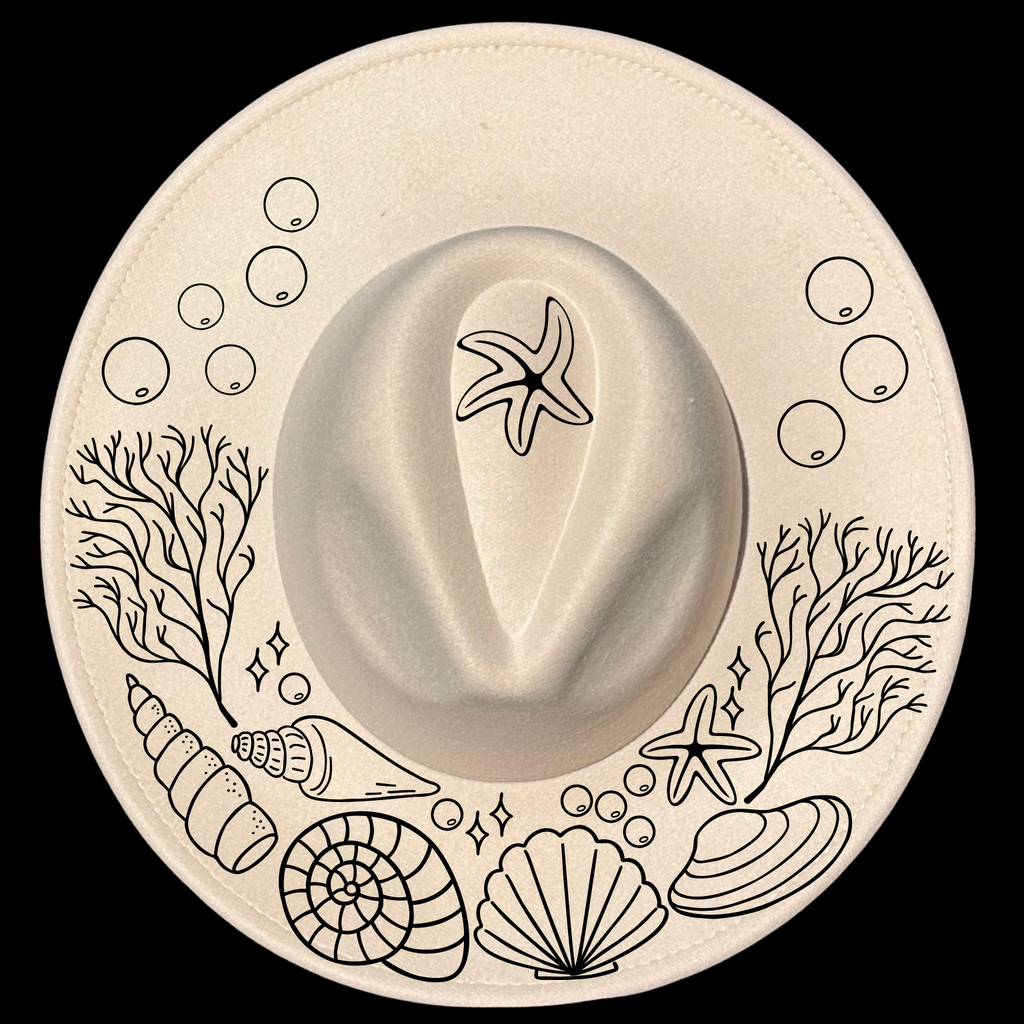 A wide brim hat with a burning design that includes sea creatures such as shells and a starfish.