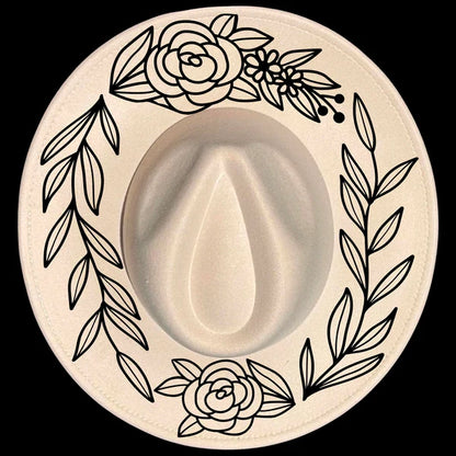 Wide brim hat with a floral pattern.