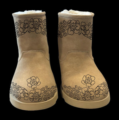 Cheetah boot burning design (outline) on a pair of boots front view.