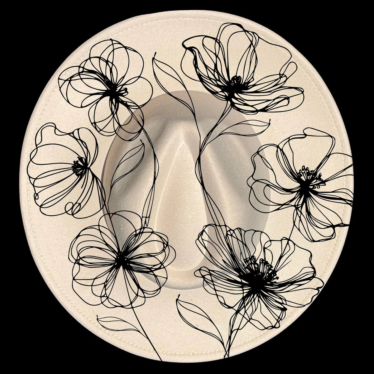 Decorative hat burning design with black poppies designs on a beige wide brim hat