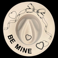 Heart-shapes with a bow, hearts, and 'BE MINE' text on a beige background