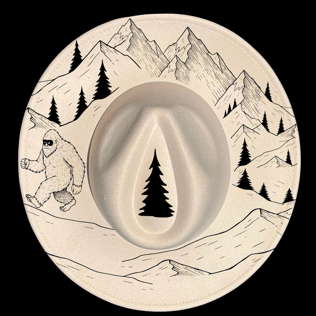 Decorative wide brim hat with mountain, tree, and bigfoot design on a black background