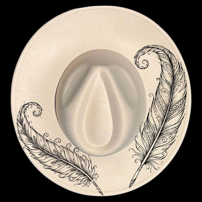 Wide brim hat with intricate feather design on a black background