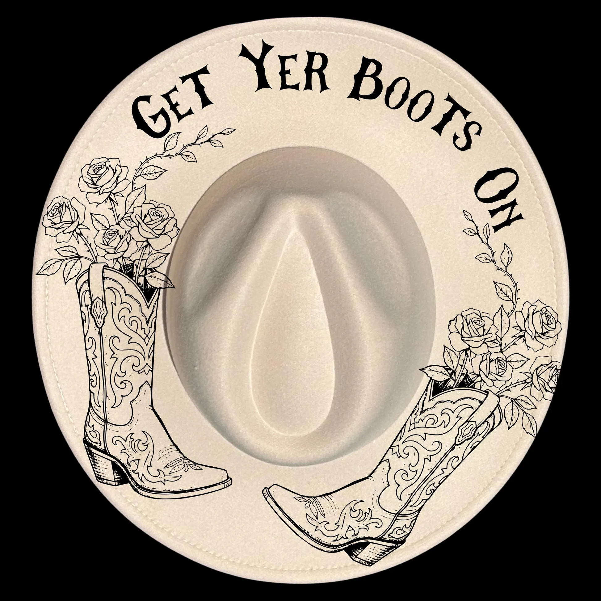 Wide brim hat with cowboy boots, roses, and 'Get Yer Boots On' text on a black background.