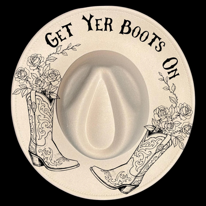 Wide brim hat with cowboy boots, roses, and 'Get Yer Boots On' text on a black background.