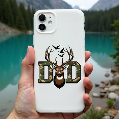 Phone case with deer design held in front of a scenic lake and mountains