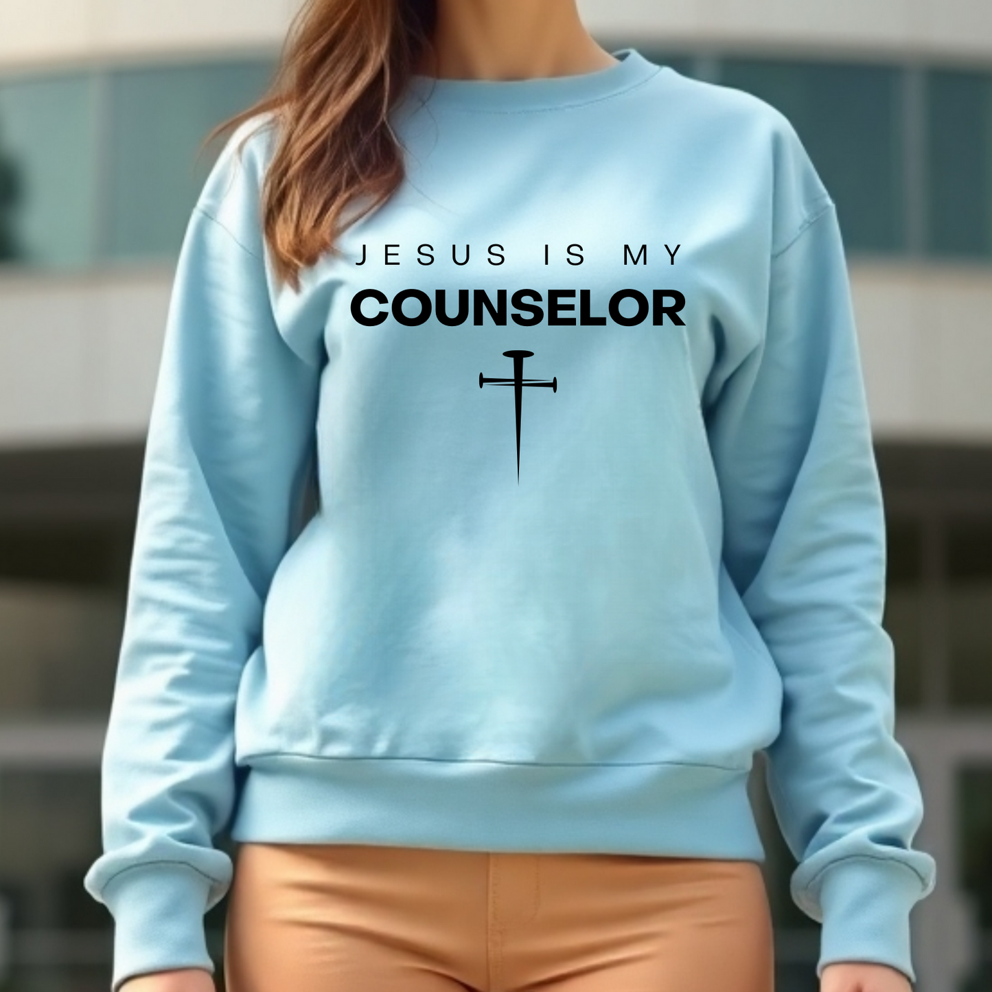 Jesus Is My Counselor digital design on a woman’s blue sweatshirt.