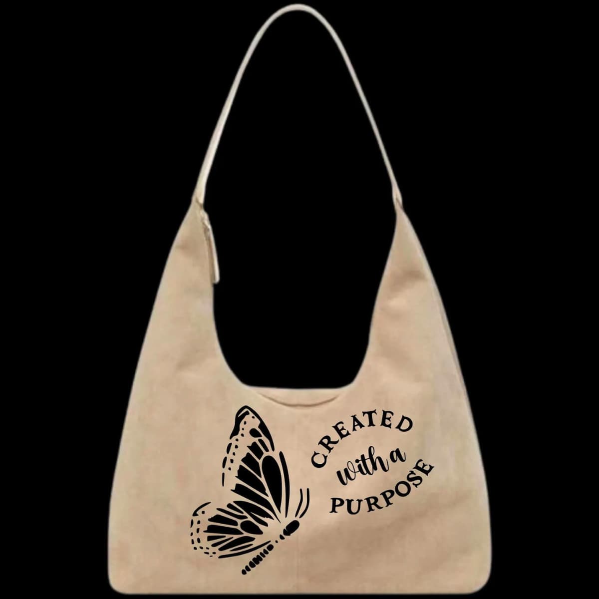 Beige tote bag with butterfly design and 'Created with a Purpose' text on a black background