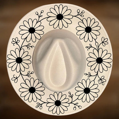 A circle of daisy designs on a wide brim hat.