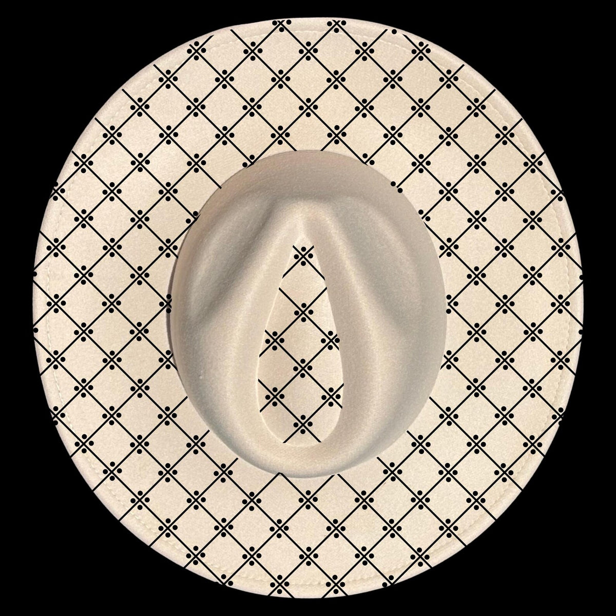 Wide brim hat with a black geometric pattern