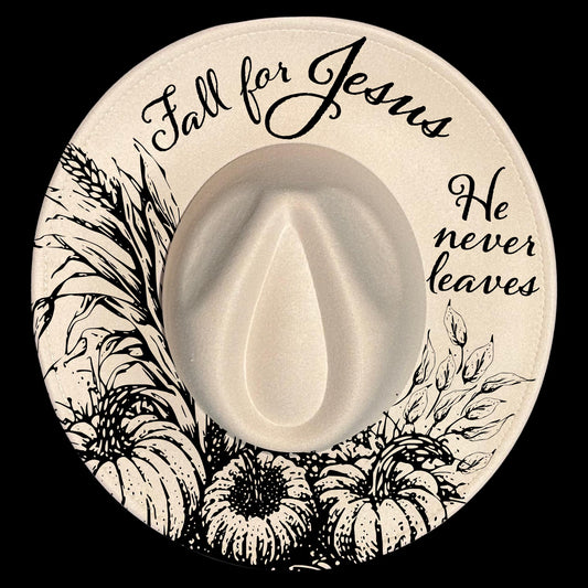 Circular design on a wide brim hat with 'Fall for Jesus' text, pumpkins, and leaves on a black background