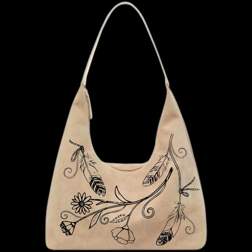 Feathers and wildflowers design on a leather purse