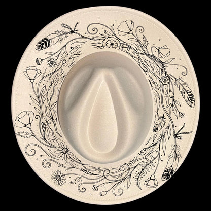 Wide brim hat with floral and leaf patterns on a black background