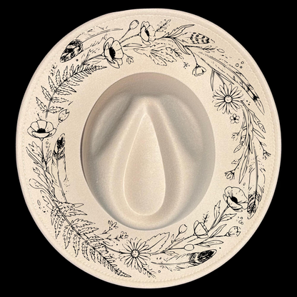 Wide brim hat with floral pattern on a black background