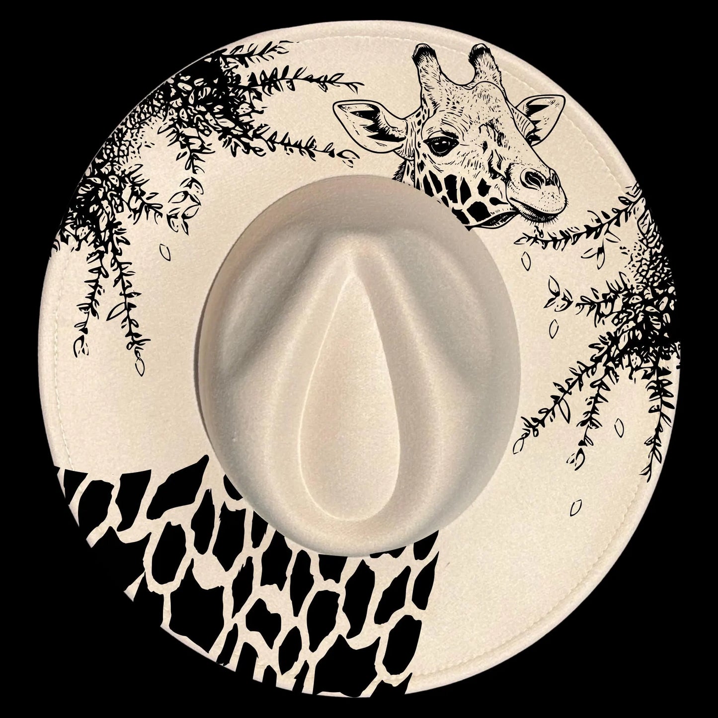 A giraffe hat burning design on a wide brim hat.