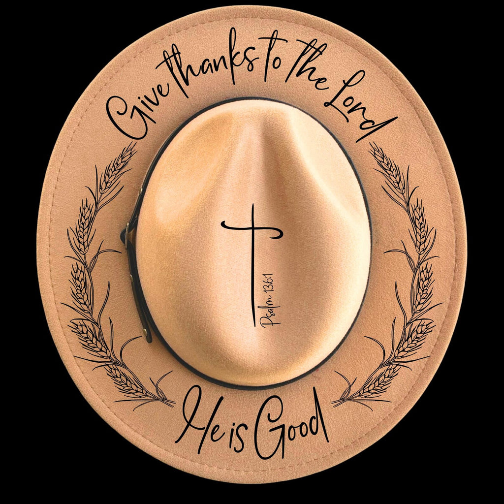 Narrow brim hat with 'Give thanks to the Lord He is Good' text and cross design on a black background