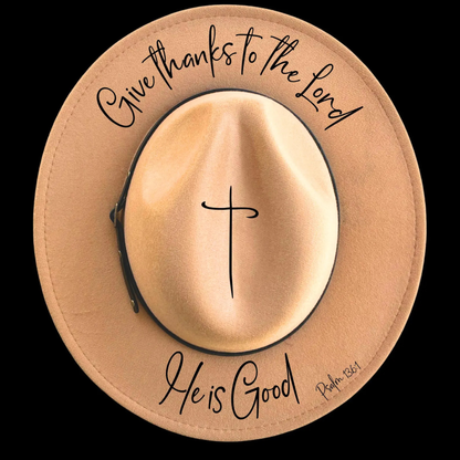 Narrow brim hat with cross and text 'Give thanks to the Lord He is Good' on a black background