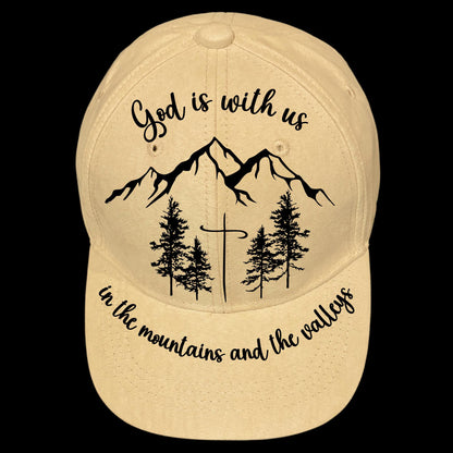 Baseball cap with mountain and tree design and text on a black background