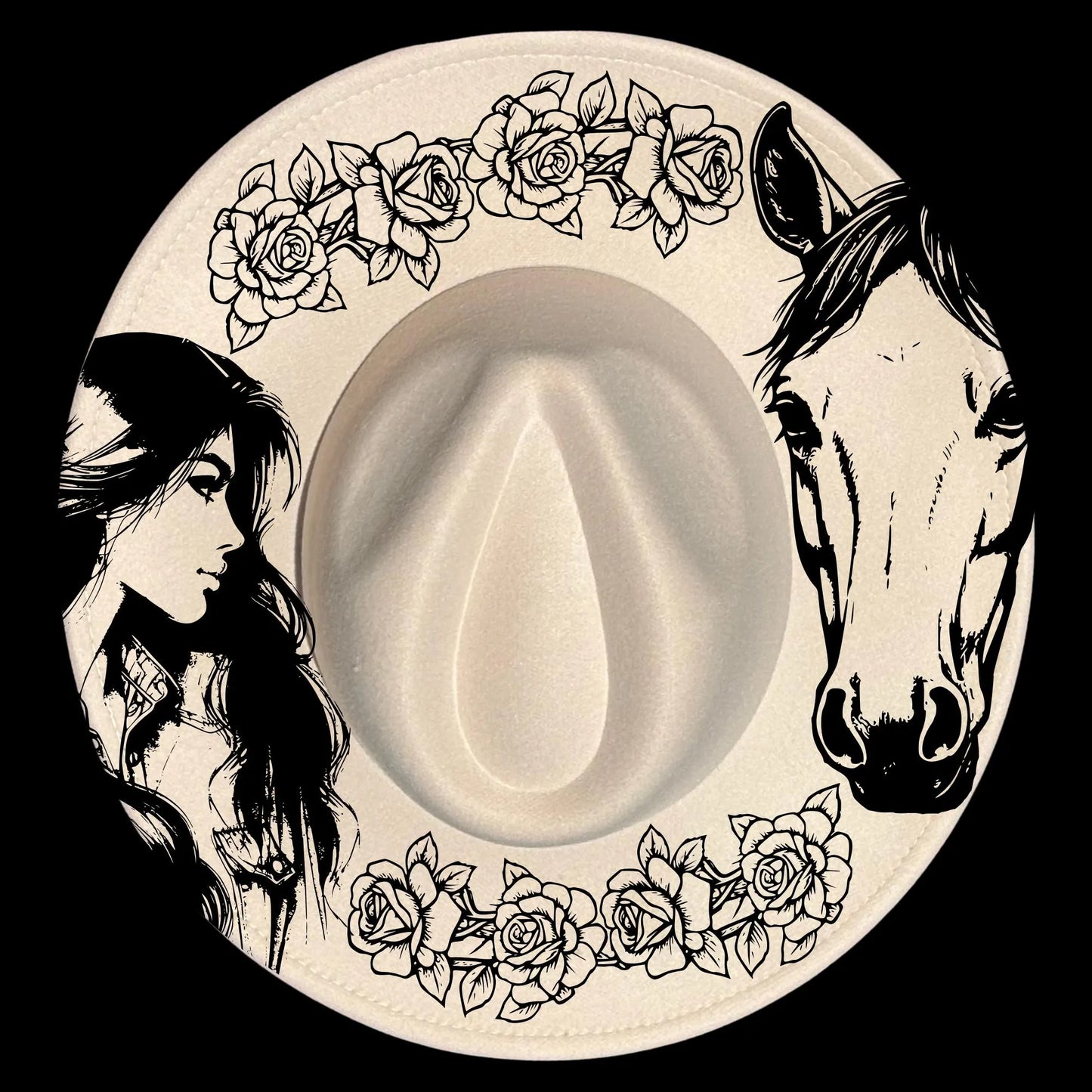 A hat burning design of a woman's face, horse's head, and floral elements on a wide brim hat.