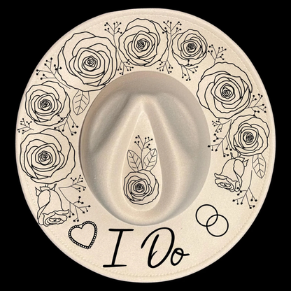 Wide brim hat with black floral designs and 'I Do' text on a black background