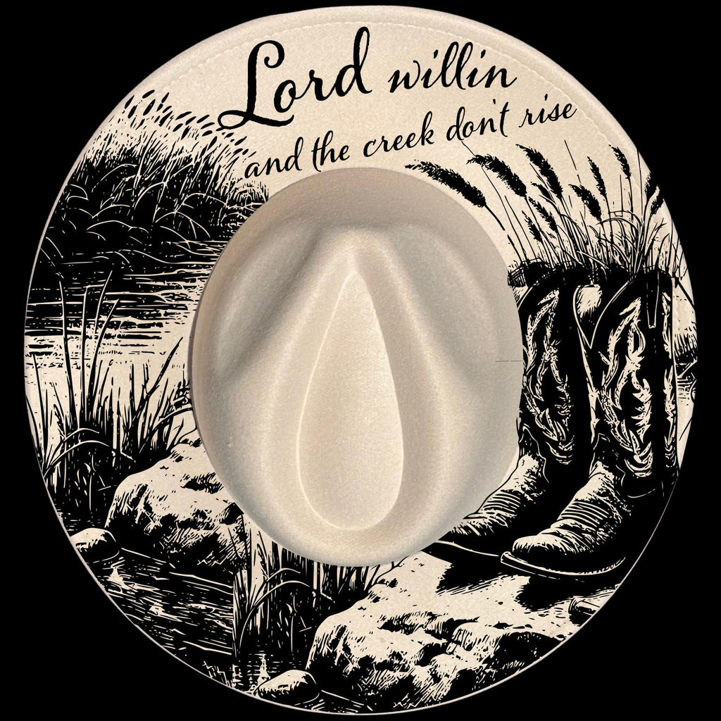 Wide brim hat with cowboy boots, a boot, and text 'Lord willin and the creek don't rise' on a black background.