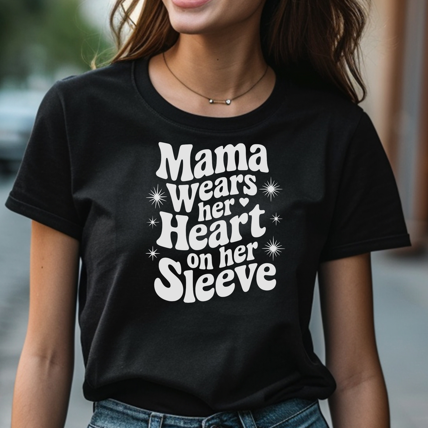 Mama Wears Her Heart On Her Sleeve digital design on a woman’s black t-shirt