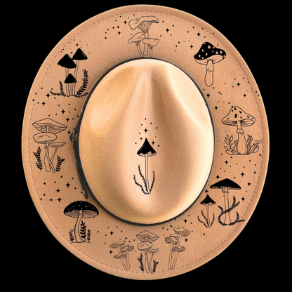 A narrow brim hat with mushroom designs on a black background
