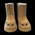 Rose Wings boots burning design on a pair of boots.