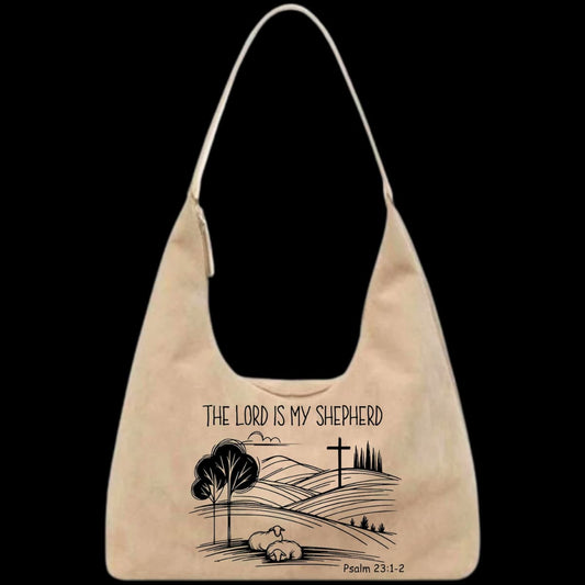 Leather tote bag with religious design and "The Lord is my Shepherd" text on a black background
