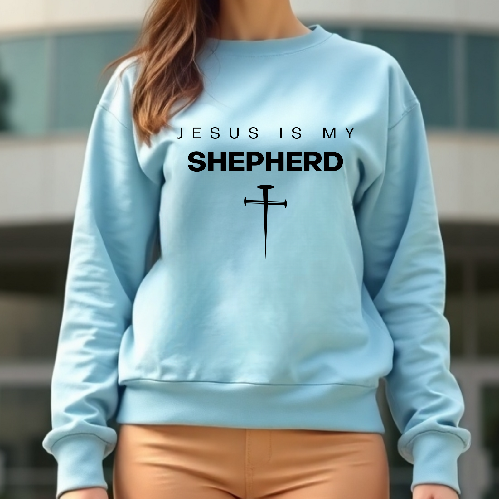 Jesus Is My Shepherd digital design on a woman’s blue sweatshirt