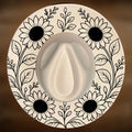 Wide brim hat burning design featuring sunflowers arranged around the brim.