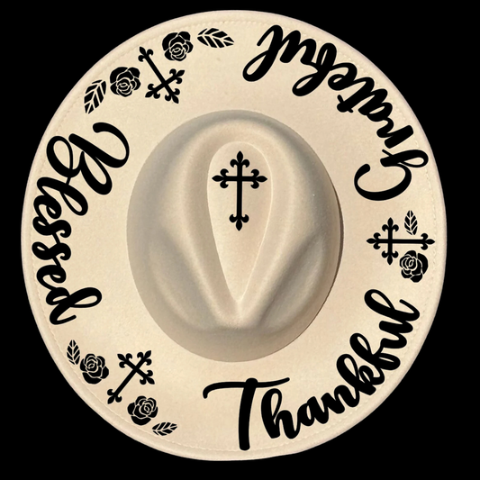 Wide brim hat with Thankful Grateful Blessed text and crosses on a black background