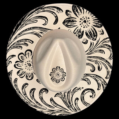 Wide brim hat with black floral and swirl patterns on a black background