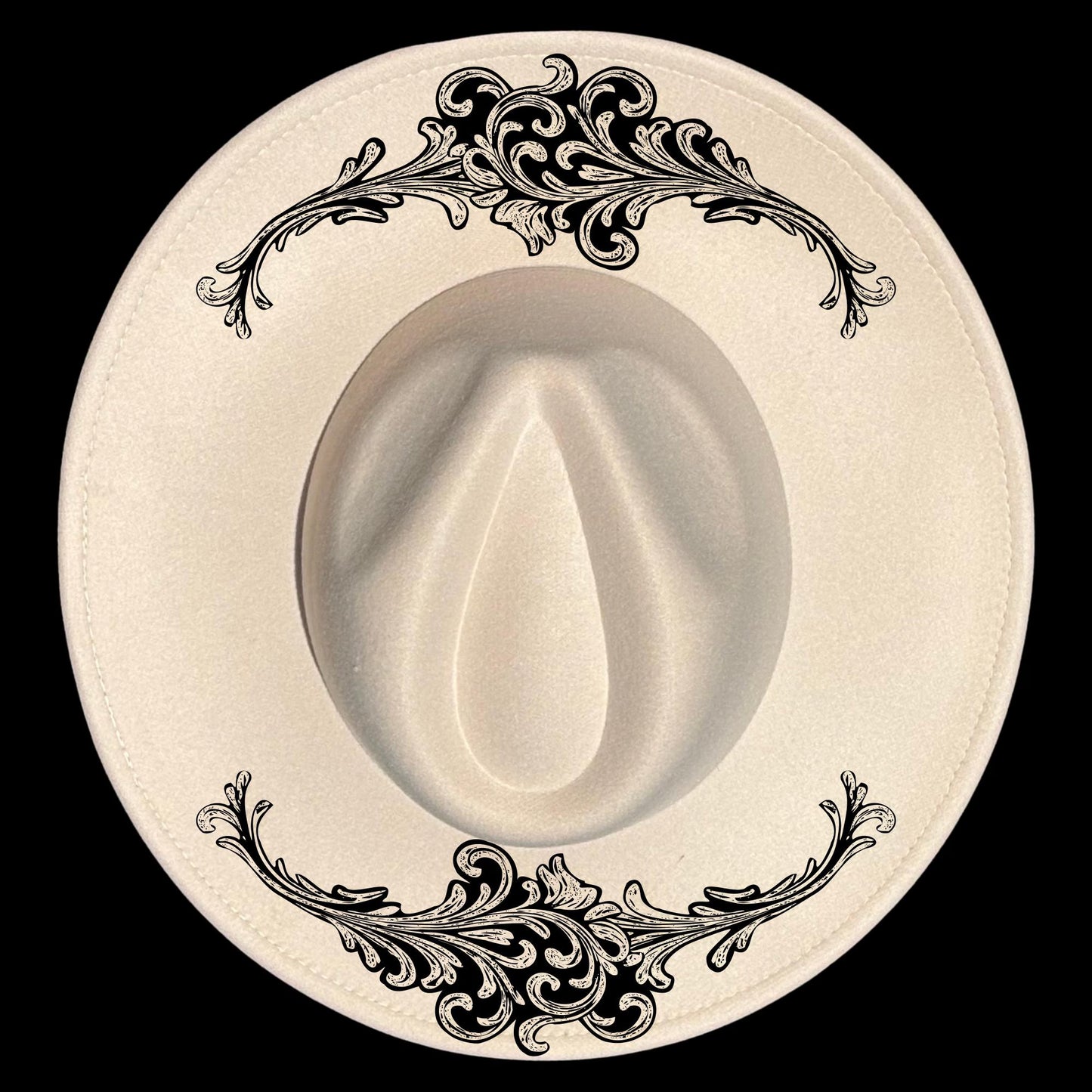 Black floral tooled look patterns on a wide brim hat