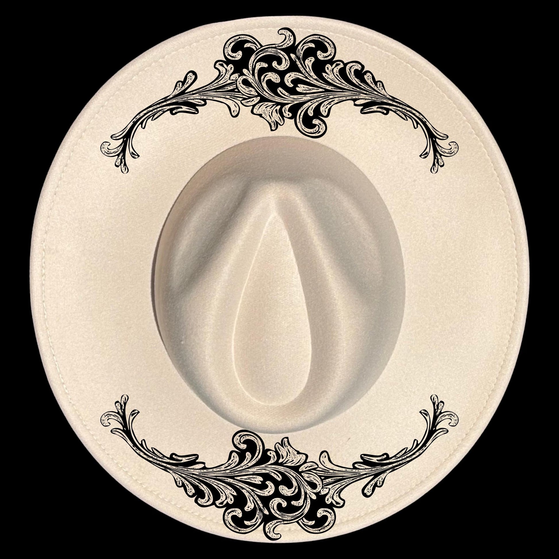 Black floral tooled look patterns on a wide brim hat