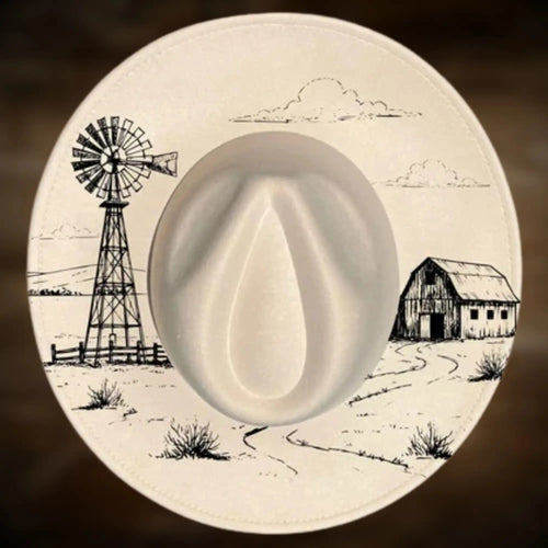 Decorative plate with a windmill and barn illustration on a brown background