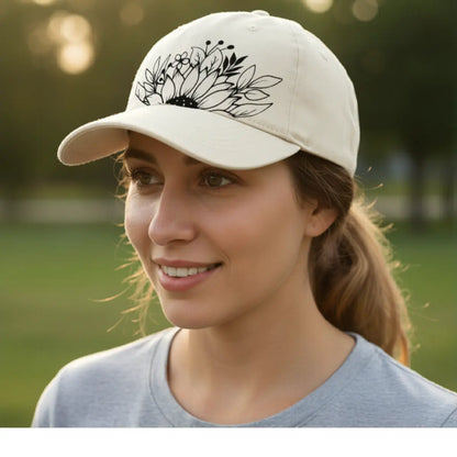 Woman wearing a beige cap with floral design outdoors